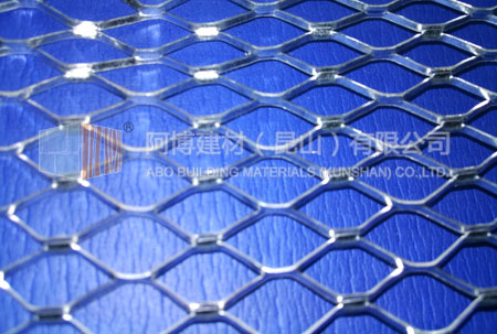 Self furring dimpled mesh lath